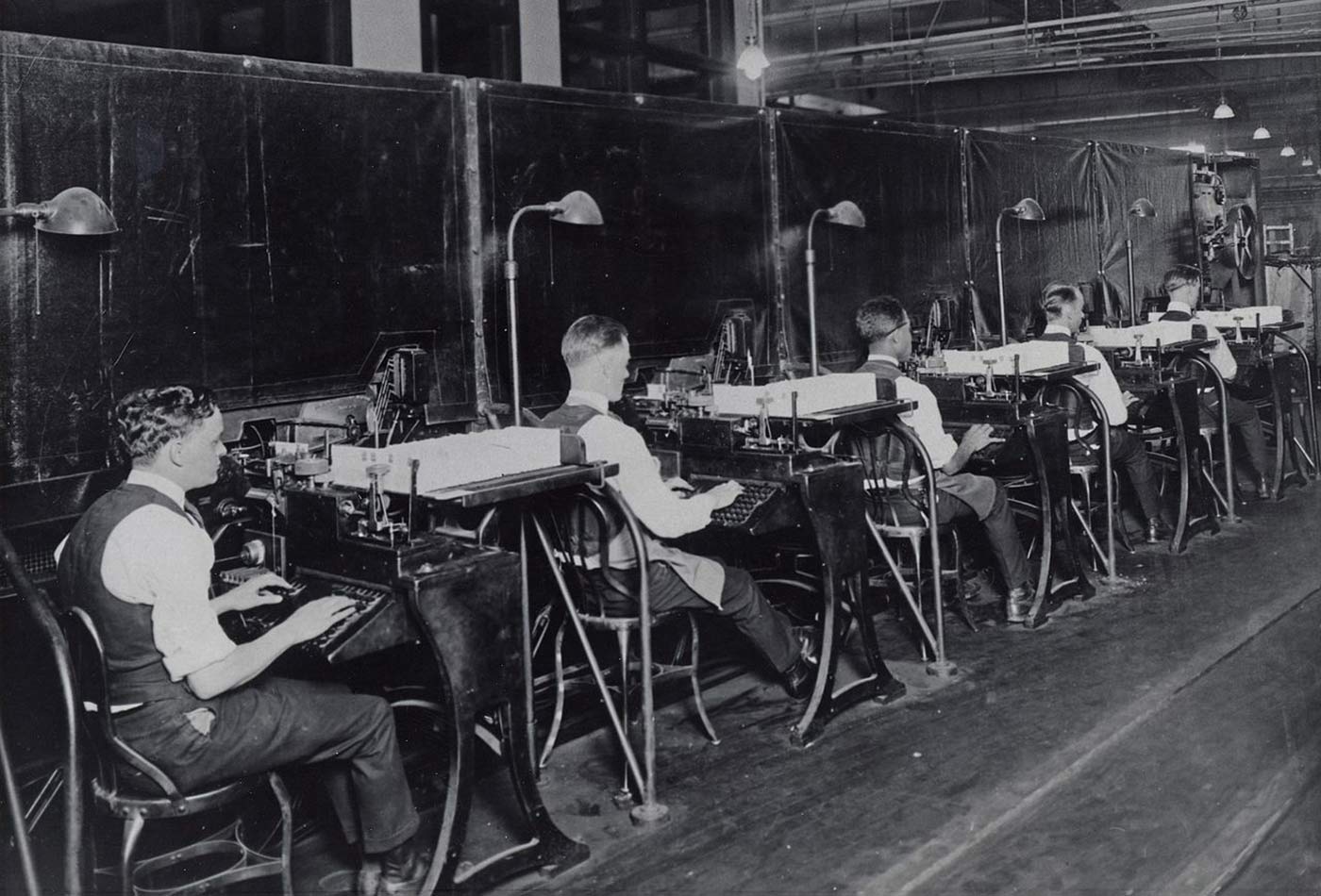 Postal clerks processing mail